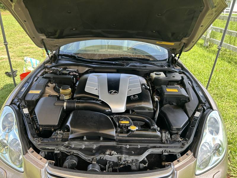 Mobile engine bay cleaning in Charlotte: Lexus SC430 engine bay with a clean V8 cover and dressed plastics